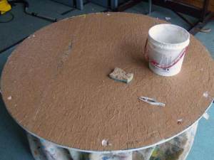 5-tile-covered-paper-turned-over-onto-tile-adhesive-covered-board